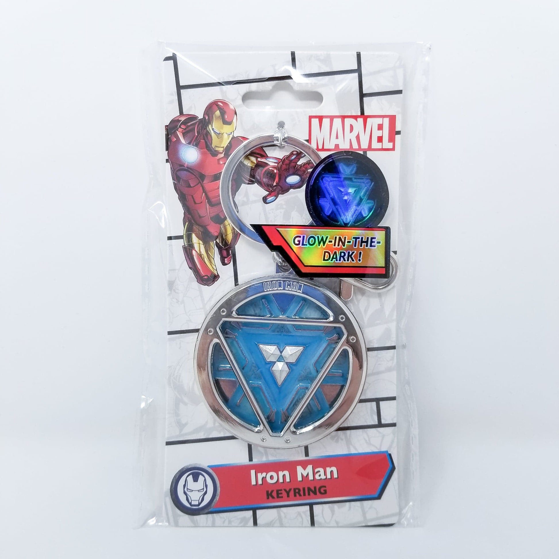 Iron Man Glow-In-The-Dark Pewter Arc Reactor Keychain.  In Celebration of Tony Stark’s Iron Man as seen in the Marvel Studios Avengers films, this oversize pewter Arc Reactor glow-in-the-dark metal keychain features the Arc Reactor powering Tony’s chest and power suit in Iron Man 3.  2 inches across & nearly 1/2 inch thick!  Features “Iron Man” logo on the back Includes stainless steel keyring and clip Blue Glow-in-the-Dark effect!  Carry your own Proof that Tony Stark Has a Heart