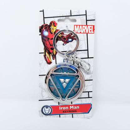 Iron Man Glow-In-The-Dark Pewter Arc Reactor Keychain.  In Celebration of Tony Stark’s Iron Man as seen in the Marvel Studios Avengers films, this oversize pewter Arc Reactor glow-in-the-dark metal keychain features the Arc Reactor powering Tony’s chest and power suit in Iron Man 3.  2 inches across & nearly 1/2 inch thick!  Features “Iron Man” logo on the back Includes stainless steel keyring and clip Blue Glow-in-the-Dark effect!  Carry your own Proof that Tony Stark Has a Heart