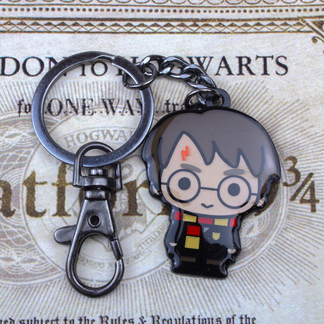 Harry Potter in Gryffindor Scarf Chibi Enamel Keychain