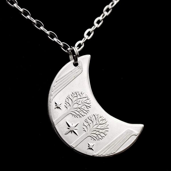 Elvish coin from Rivendell is shaped like a crescent moon. It depicts the valley containing the ancient trees of silver and gold and the three Silmarils, represented as stars. The text in Tengwar translates from Sindarin to Elrond Peredhil, Lord of Rivendell, The Last Homely House East of the Sea. It includes the date that Thorin and Company meet Elrond at Rivendell before continuing on to The Lonely Mountain.  This Rivendell Moon is crafted in celebration of The Lord of the Rings by J. R. R. Tolkien