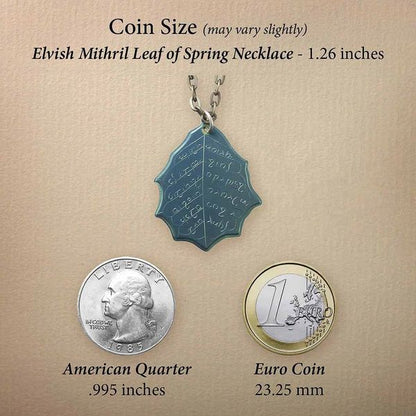 This Elvish Mithril Leaf of Spring Necklace is crafted in celebration of The Lord of the Rings by J. R. R. Tolkien. The leaf-shaped coin is struck from solid niobium, measures 2.7 cm in diameter, and weighs about 6.5 grams. Includes a 30" antique bronze cable chain with clasp. Coin artwork by Greg Franck-Weiby.  Coins are struck one at a time in the USA using antique machinery and traditional coining techniques. A colorful description is included with history, translations, and facts about the coins.