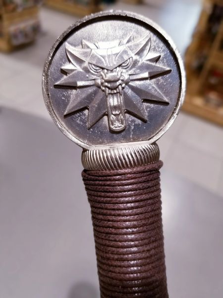  Geralt of Rivia's iconic Steel sword is said to be for humans, while his Silver blade is for Monsters - At another time, Geralt clarifies they all for Monsters. Either way, the Steel sword is the heavy-duty blade in Geralt's arsena.  This recreation is as stunning to hold in person as it is to look at! Made from quality heavy stainless steel, this replica of the Steel Witcher Sword has been crafted to resemble Geralt's iconic sword from the games with its recognizable hilt shape and detailing