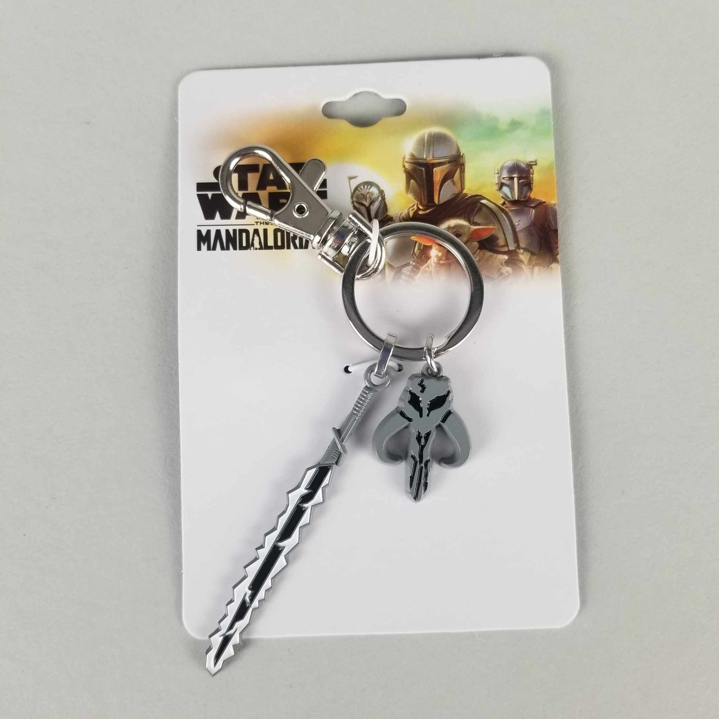 Mythosaur Skull and Darksaber (Star Wars: The Mandalorian) Metal Enamel Keychain