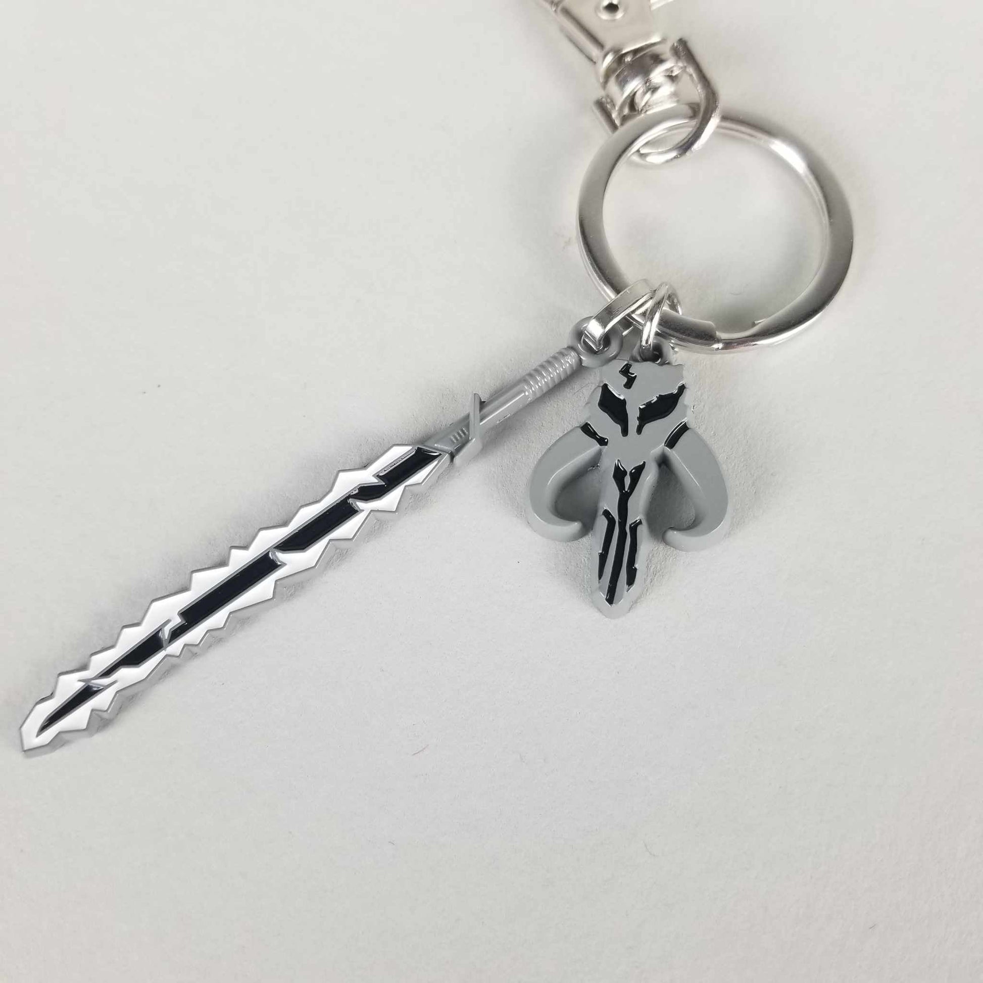 Mythosaur Skull and Darksaber (Star Wars: The Mandalorian) Metal Enamel Keychain